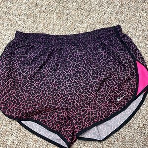 purple/ pink print NIKE athletic shorts